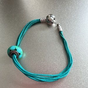 Free Pandora Teal charm with multi-strand bracelet purchase!